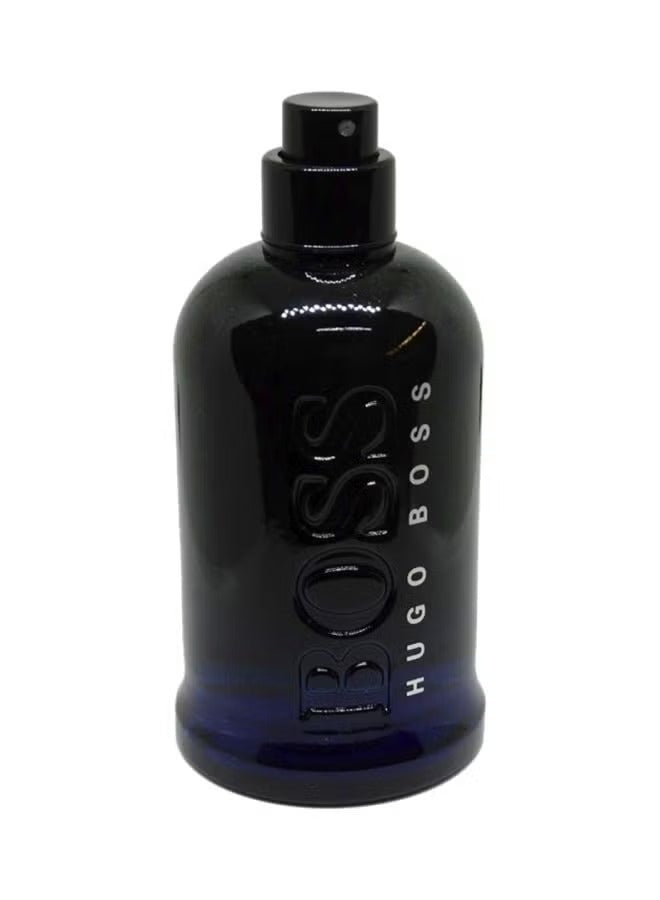 Hugo Boss Bottled Night EDT 100ml in a sleek black and blue bottle with a spray nozzle