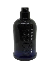 Bottled Night EDT 100ml perfume bottle with black cap and blue-tinged base