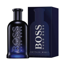 Men's fragrance bottle with matching navy box, black cap, blue logo