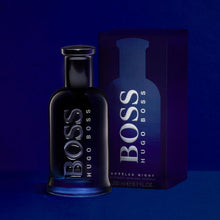 Hugo Boss eau de toilette bottle with matching box, dark glass and blue base