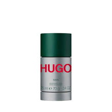 HUGO Man deodorant stick with green cap and silver base, HUGO label on front