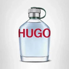 HUGO eau de toilette bottle with ribbed silver cap and green loop, light blue glass