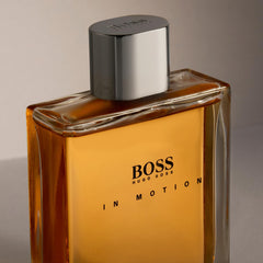 Hugo Boss In Motion for men cologne bottle with amber liquid and silver cap