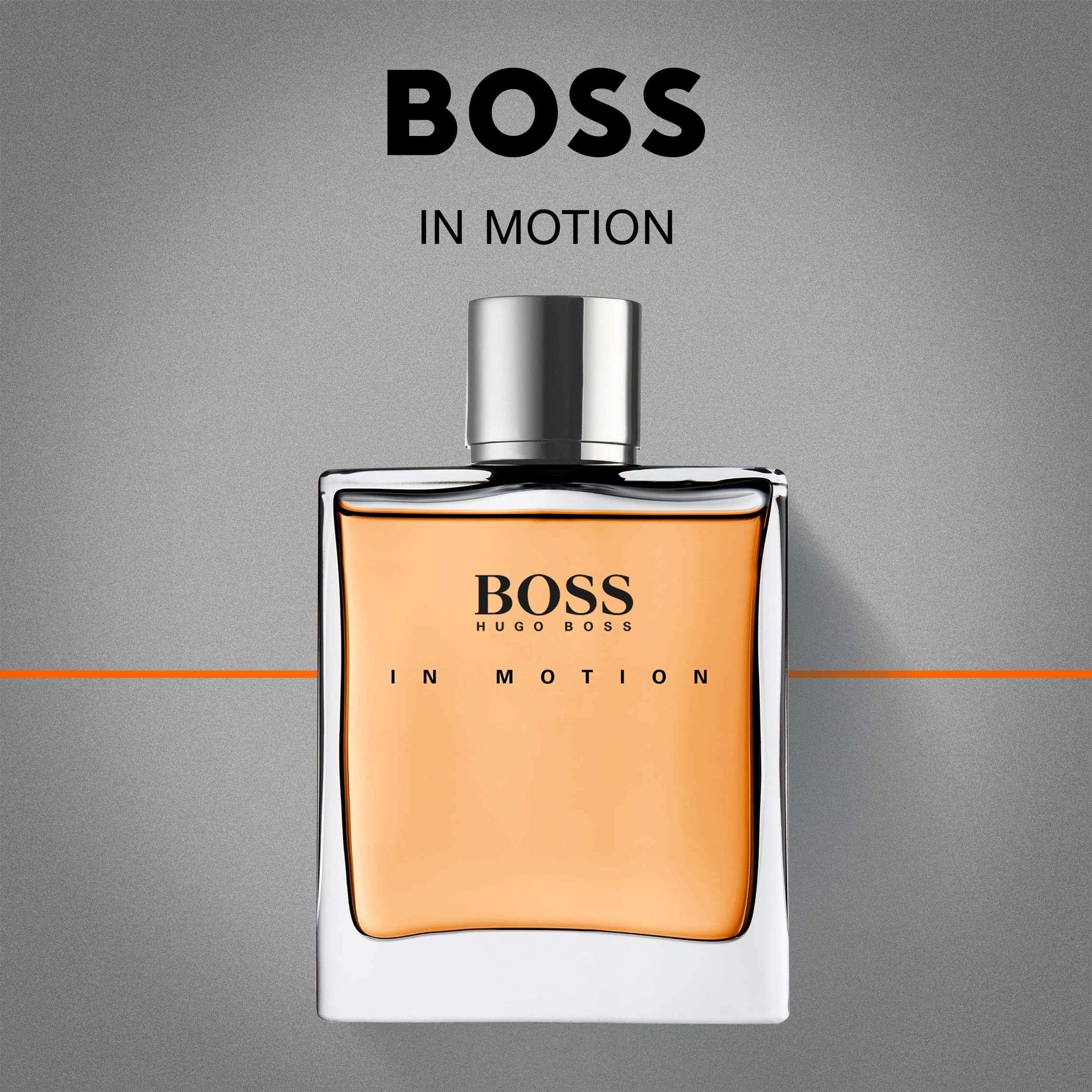 Hugo Boss In Motion for men perfume bottle with amber liquid and silver cap on gray background