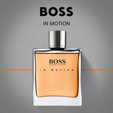 Men's fragrance bottle with amber liquid and silver cap; BOSS IN MOTION label on front.