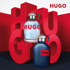Hugo Boss Man fragrance for men displayed in clear and dark blue bottles with bold red Hugo branding
