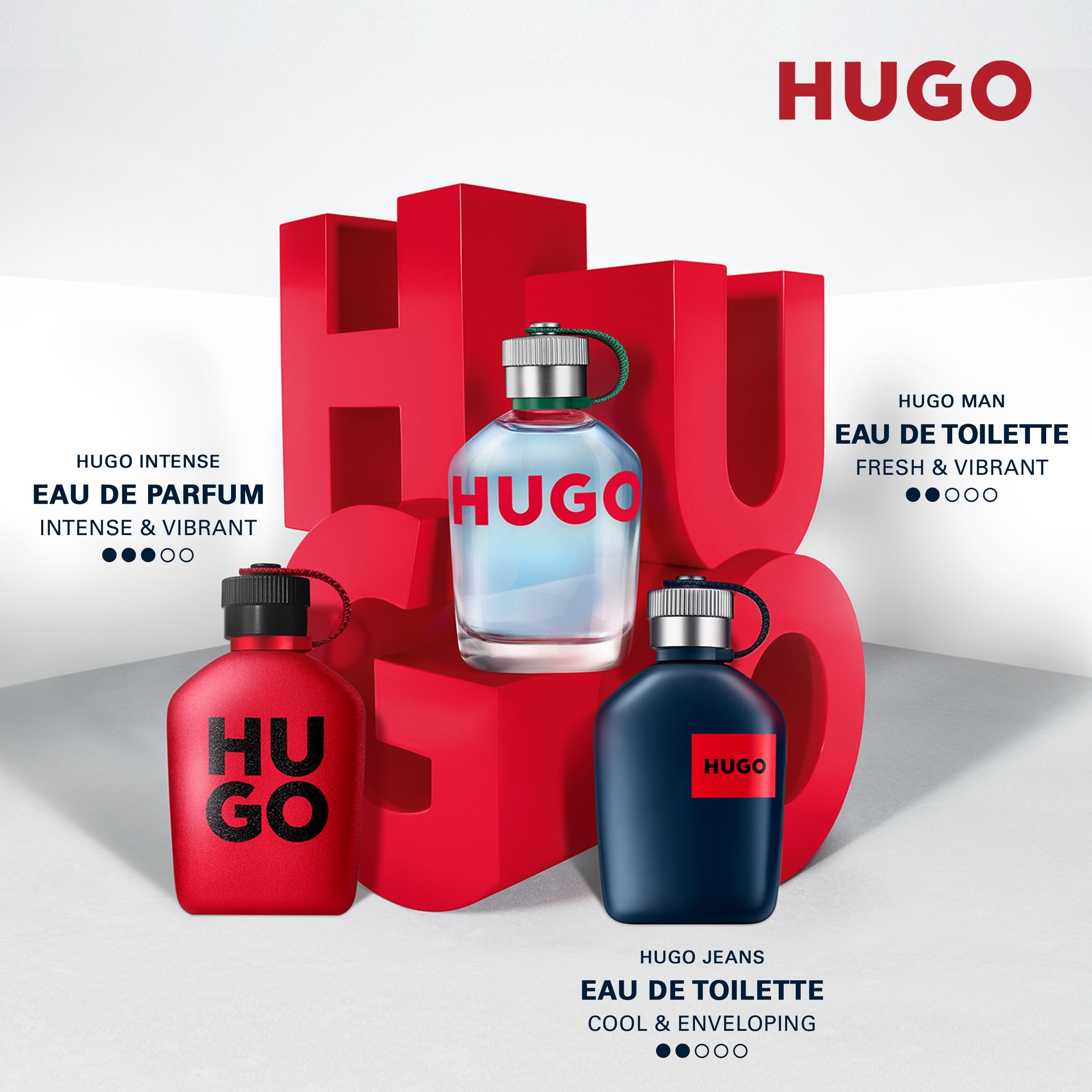 Hugo Boss Man fragrance for men collection with Eau de Parfum and Eau de Toilette bottles in red, blue, and clear glass