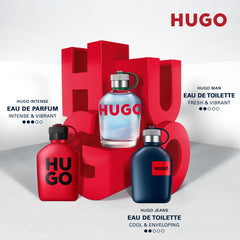 Hugo Boss Man fragrance for men collection with Eau de Parfum and Eau de Toilette bottles in red, blue, and clear glass