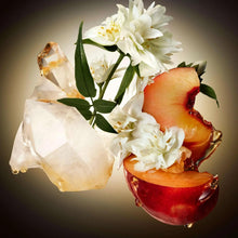 Perfume-themed scene with white flowers, citrus slices, and amber droplets