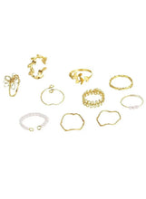 10-piece gold-tone ring set with assorted shapes and one light rhinestone ring