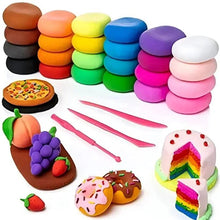 Stacked balls of colorful modeling clay with molded treats and tools