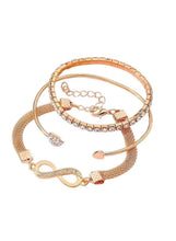 Gold-tone bracelet set with infinity charm and crystal accents, three bangles