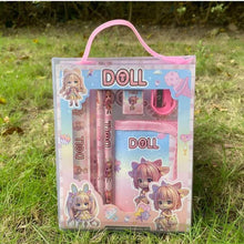 Doll-themed stationery set in clear box with pink handle and chibi doll artwork