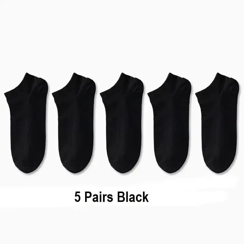Set of plain black boat socks, five pairs shown