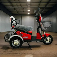 Red electric trike scooter with front basket and gray seat cover, side profile.