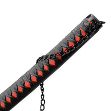Kids toy katana grip with gray wrap and red diamond pattern, black guard and chain
