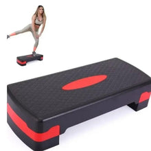 Portable aerobic step platform, black top with red center oval grip, with side supports