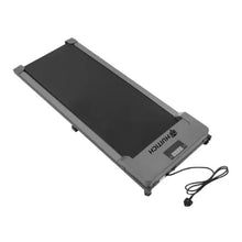 Portable walking treadmill folded with power cord attached