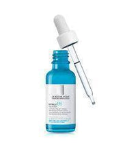 La Roche-Posay Hyalu B5 face serum bottle with white dropper, blue liquid in glass