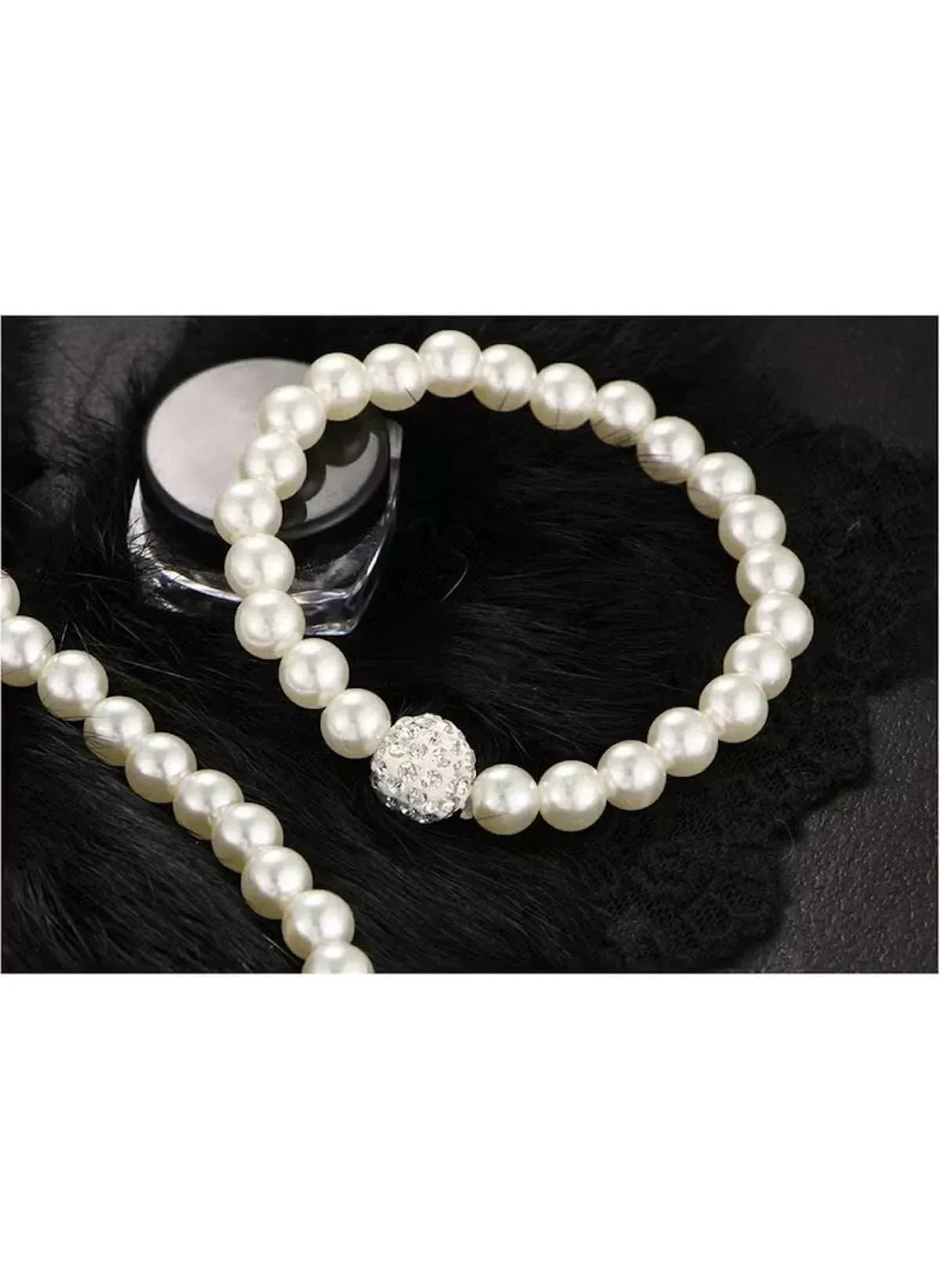 Faux pearl necklace and bracelet set with sparkling charm detail