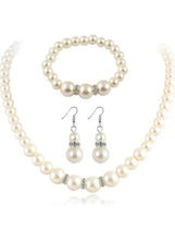Imitation pearl jewelry set with beaded necklace, bracelet, and dangling earrings