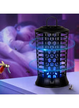 Indoor mosquito killer lamp with black protective cage and blue UV glow