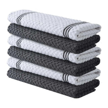 Stack of striped cotton kitchen towels, dark gray and white folded