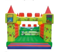 Inflatable bouncing house castle with green, yellow, and red walls and blue landing mat