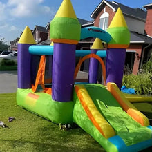 Inflatable bouncy castle with slide and arch entrance, purple and green with yellow tops
