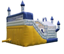 Inflatable bouncy castle corner view with yellow inflatable wall and blue slide