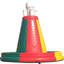 Inflatable climbing slide close-up of red center tower, yellow side, green base