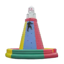 Inflatable climbing slide with red, blue, yellow and green panels, tall white top