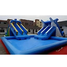 Inflatable blue swimming pool with two slides and ladder, red edge