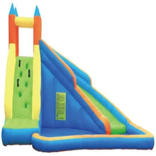Inflatable water slide with tall green-and-orange tower and blue slide chute