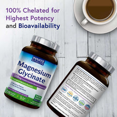 Innate Vitality magnesium glycinate 500mg supplement two amber bottles front and back on white wood background with coffee cup