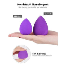 Makeup beauty sponge, purple teardrop shape held in hand for blending