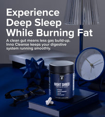 Inno Supps Night Shred review jar and capsules on blue book with clock lamp and glasses showing sleep and fat burn