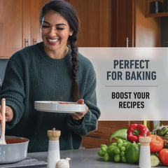 Woman cooking in kitchen with vegetables promoting Isopure unflavored whey protein powder for baking
