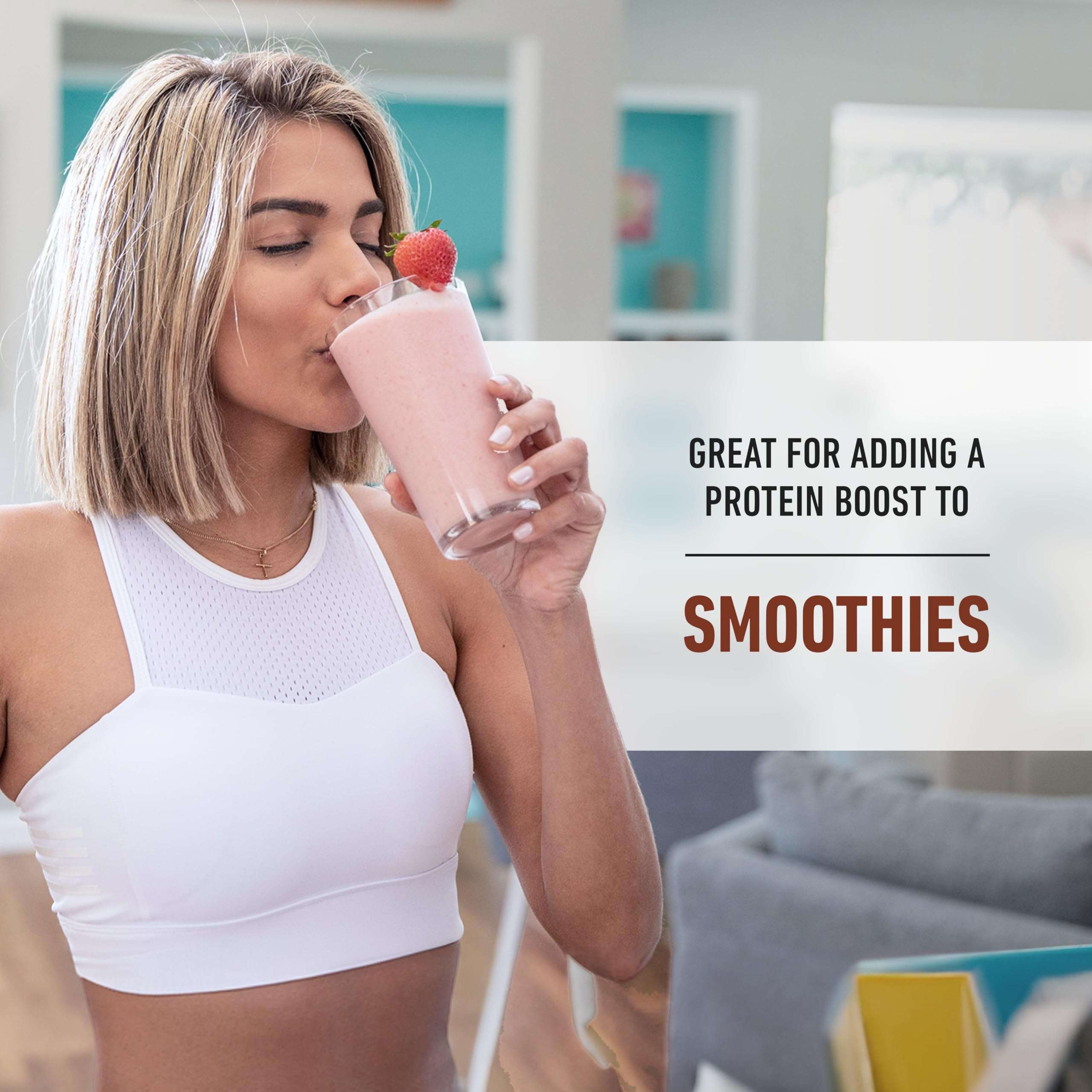Woman in white workout top sipping strawberry smoothie with Isopure whey protein isolate overlay text
