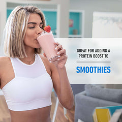 Woman in white workout top drinking strawberry smoothie with Isopure Zero Carb Whey Protein