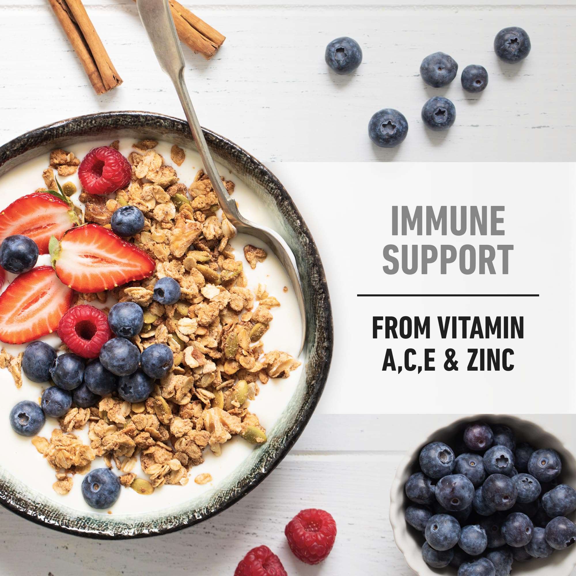 Isopure zero carb whey protein isolate showing yogurt bowl with granola strawberries blueberries and immune support