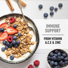 Granola with strawberries and blueberries, immune support text with vitamin A, C, E, zinc