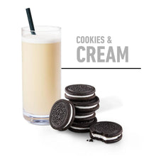 Cookies & Cream protein shake in a glass with stacked cookies