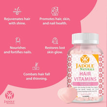 Jadole Naturals Hair Vitamins gummy bottle with benefit icons and pink hearts