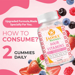 Jadole Naturals hair growth vitamins gummies bottle with berries and label showing 2 gummies daily