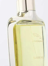 Jaguar Classic Gold EDT spray bottle close-up with golden liquid and cap