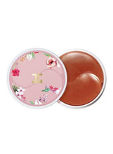 Roselle tea eye gel patches tin with floral lid and clear window, brown gel