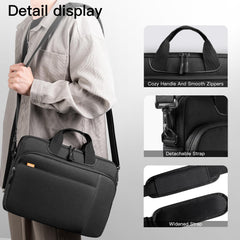 JETech laptop case with shoulder strap shown being carried with cozy handle detachable and widened strap