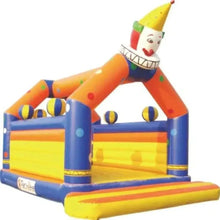 Inflatable bounce house with clown figure, orange slide, and blue yellow walls