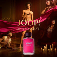 Joop Homme perfume bottle with pink liquid and dark cap, shown centered.